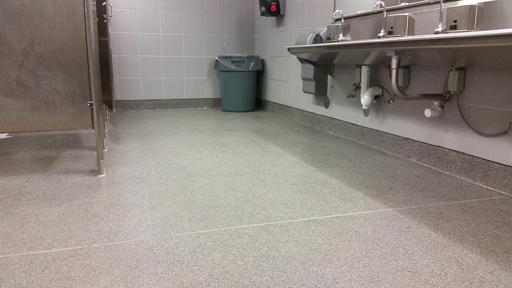 Images of decorative quartz flooring in public rest rooms