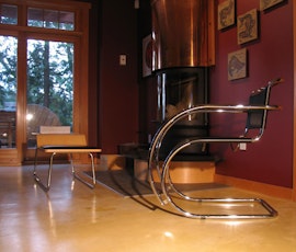 Residential home owners may choose resurfaced concrete flooring as a contemporary interior design option. (thumbnail)