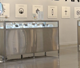 A high-gloss resurfaced concrete floor is just what the retailer needed to compliment their high-end brand. (thumbnail)