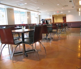 The cafeteria at this grocer chose a decorative polished concrete floor for its aesthetic value and easy maintenance. (thumbnail)
