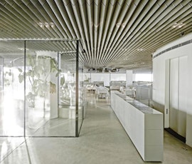 Glass and concrete are two of the contemporary materials used to create the ultra-modern restaurant, Stereokitchen. The flooring is a concrete overlay from Duraamen. (thumbnail)